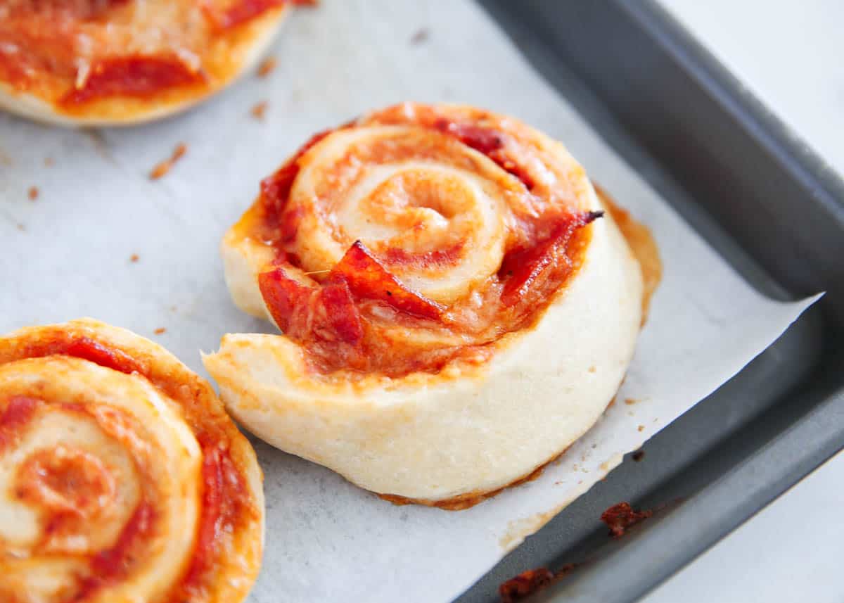pizza pinwheels on baking sheet
