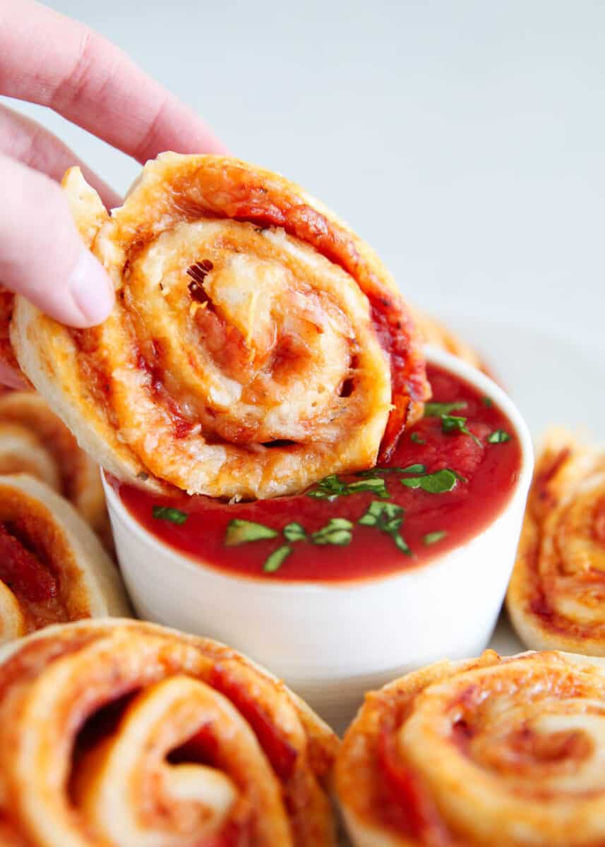 pizza pinwheels dipped in red sauce