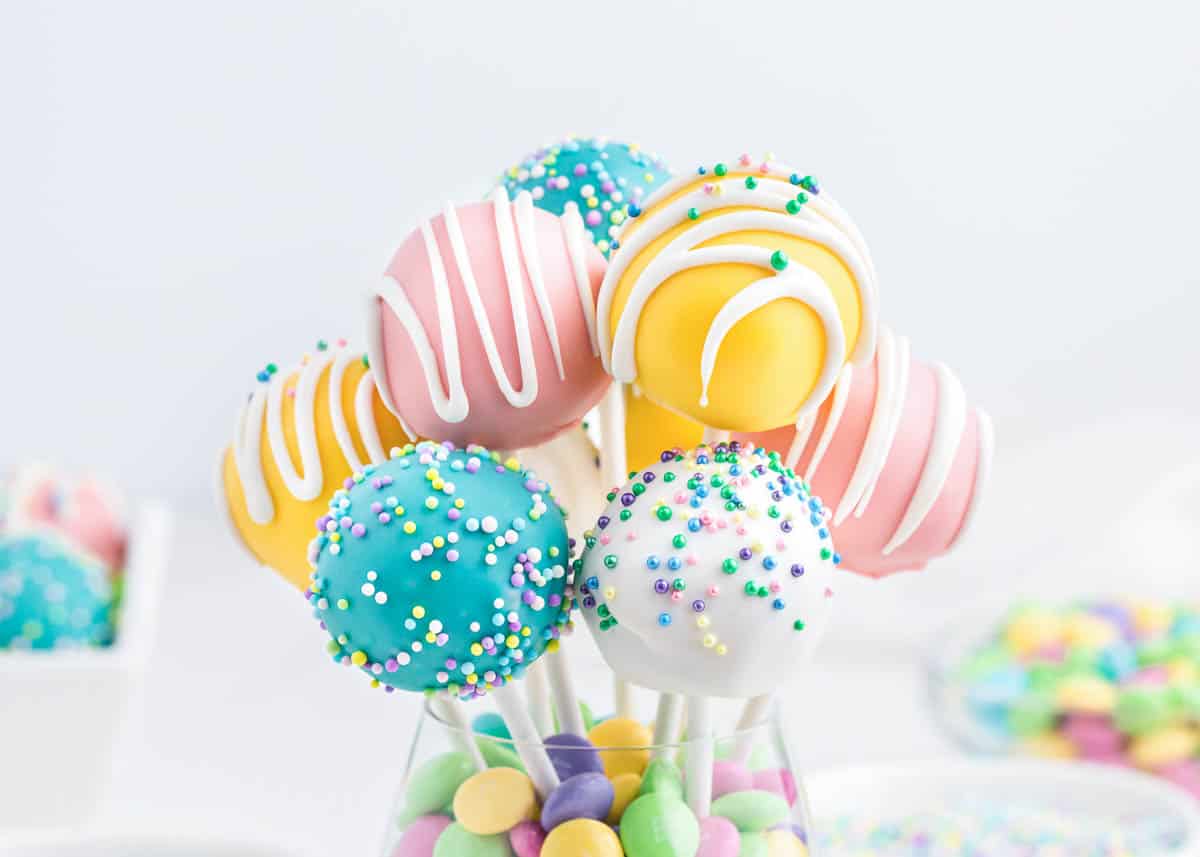 These Easter cake pops are simply adorable, super tasty, and easy to whip up in time for this year's Easter celebrations! A bouquet of cake pops would make an adorable centerpiece and an easy way for guests to grab one to go! easter cake pops in cup