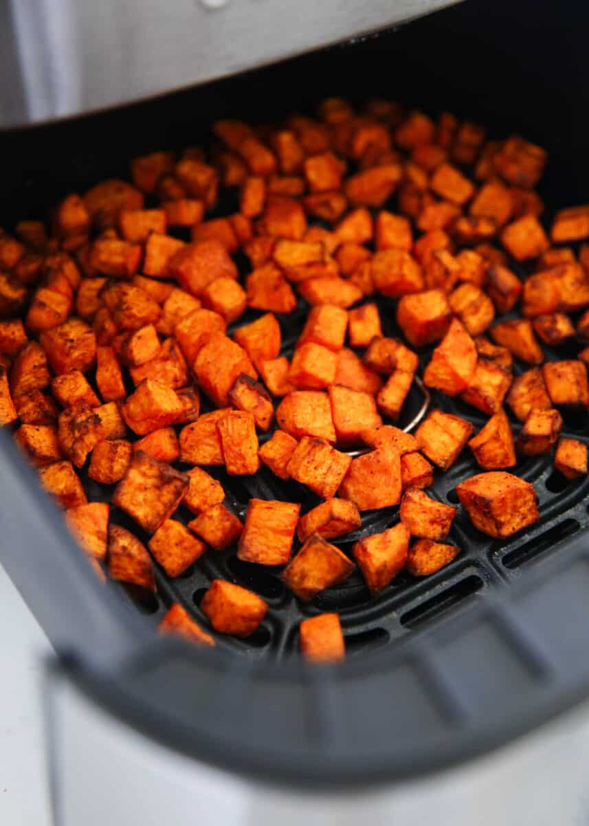 Roasted sweet potato cubes in air fryer. 