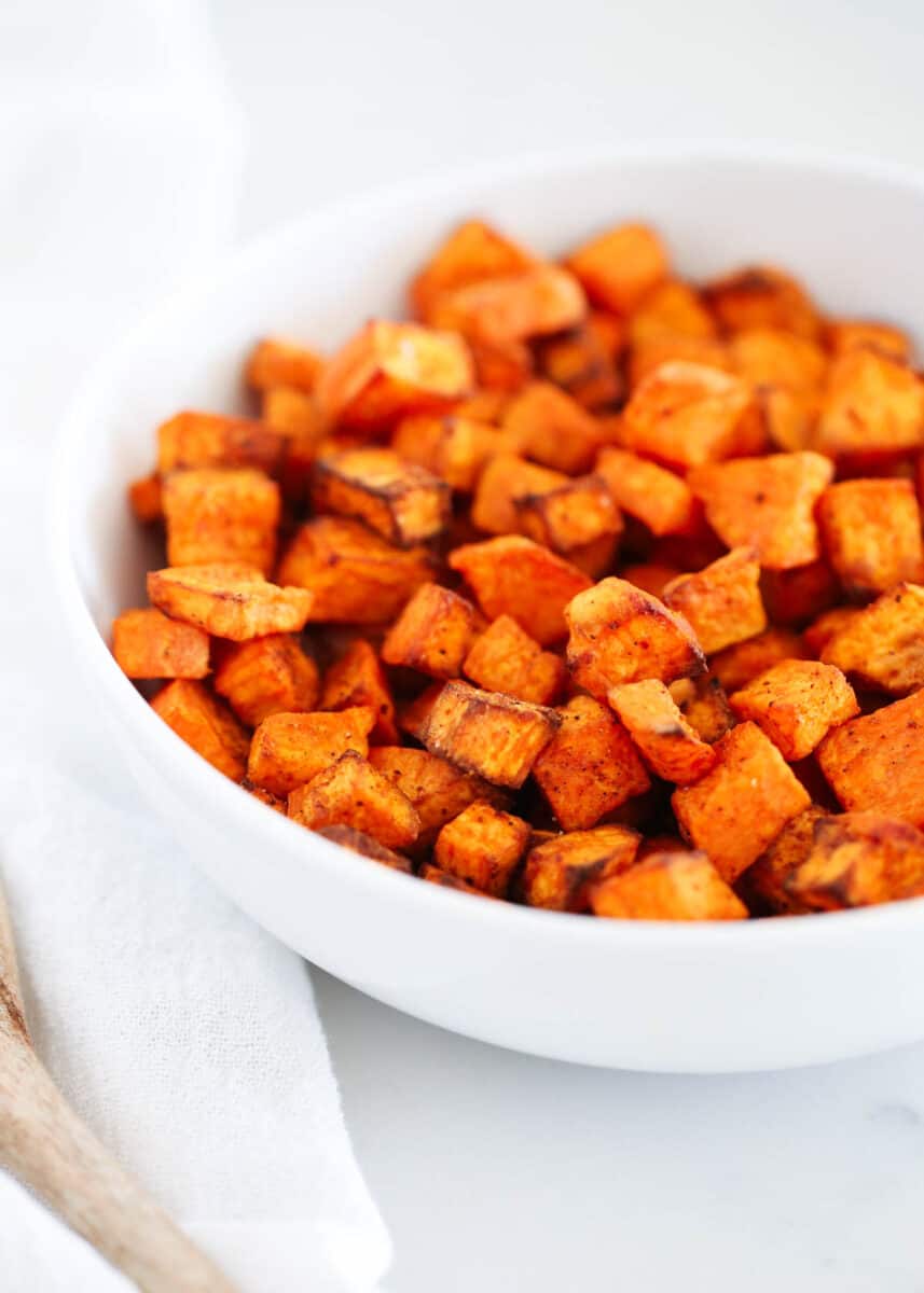 Air fryer sweet potato cubes in bowl. 