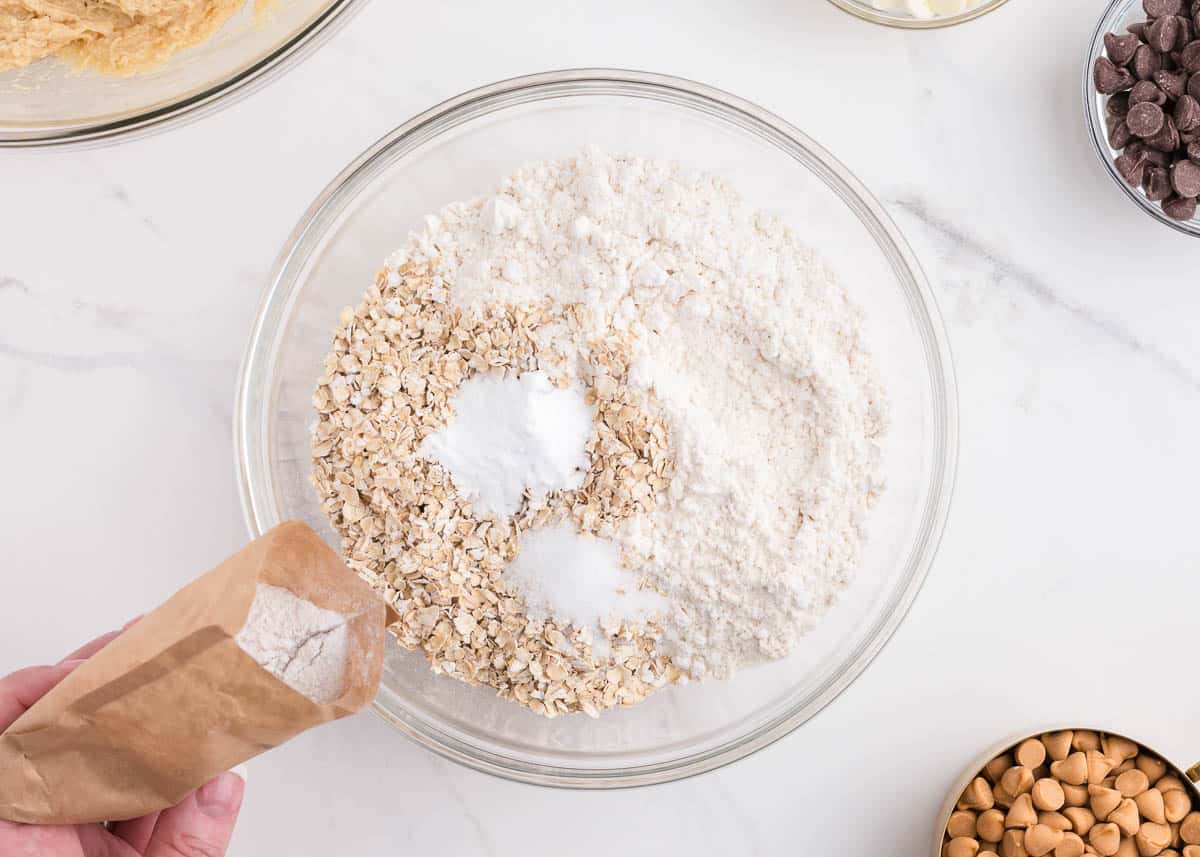 pouring flour into bowl