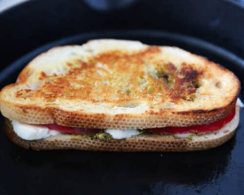 grilled caprese sandwich in skillet