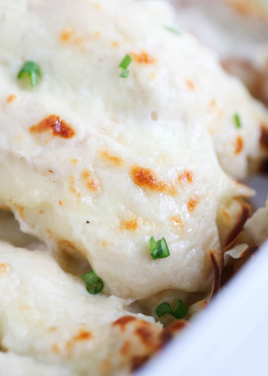 chicken crepes with cheese on top