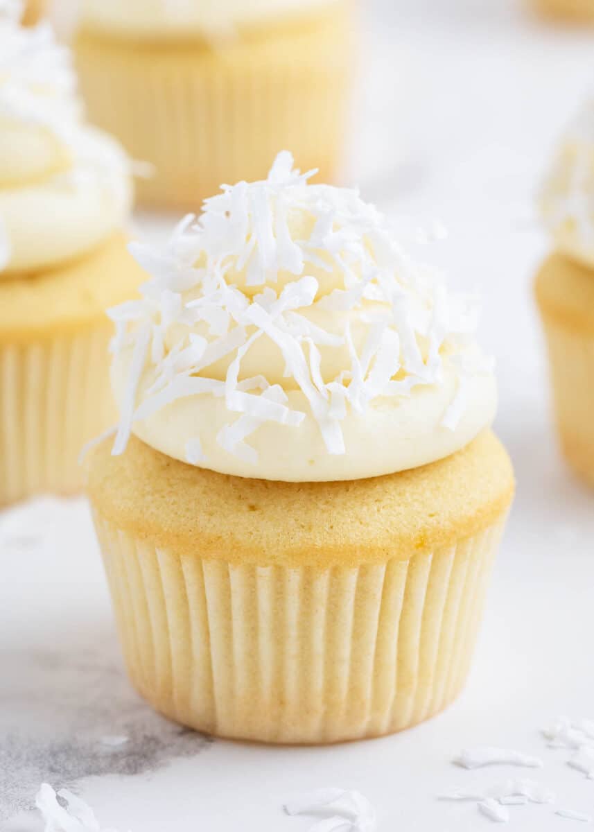 coconut cupcake on marble counter