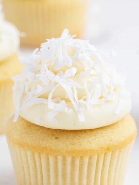 coconut frosting on top of cupcake