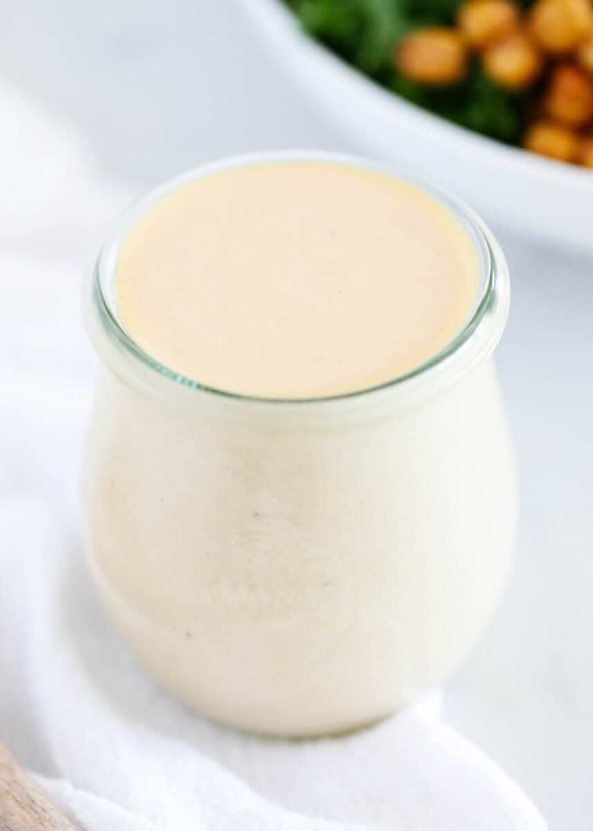 lemon tahini dressing in glass jar