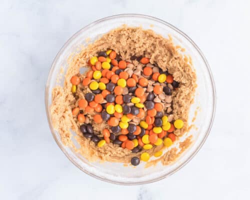 peanut butter dough and reeses in bowl
