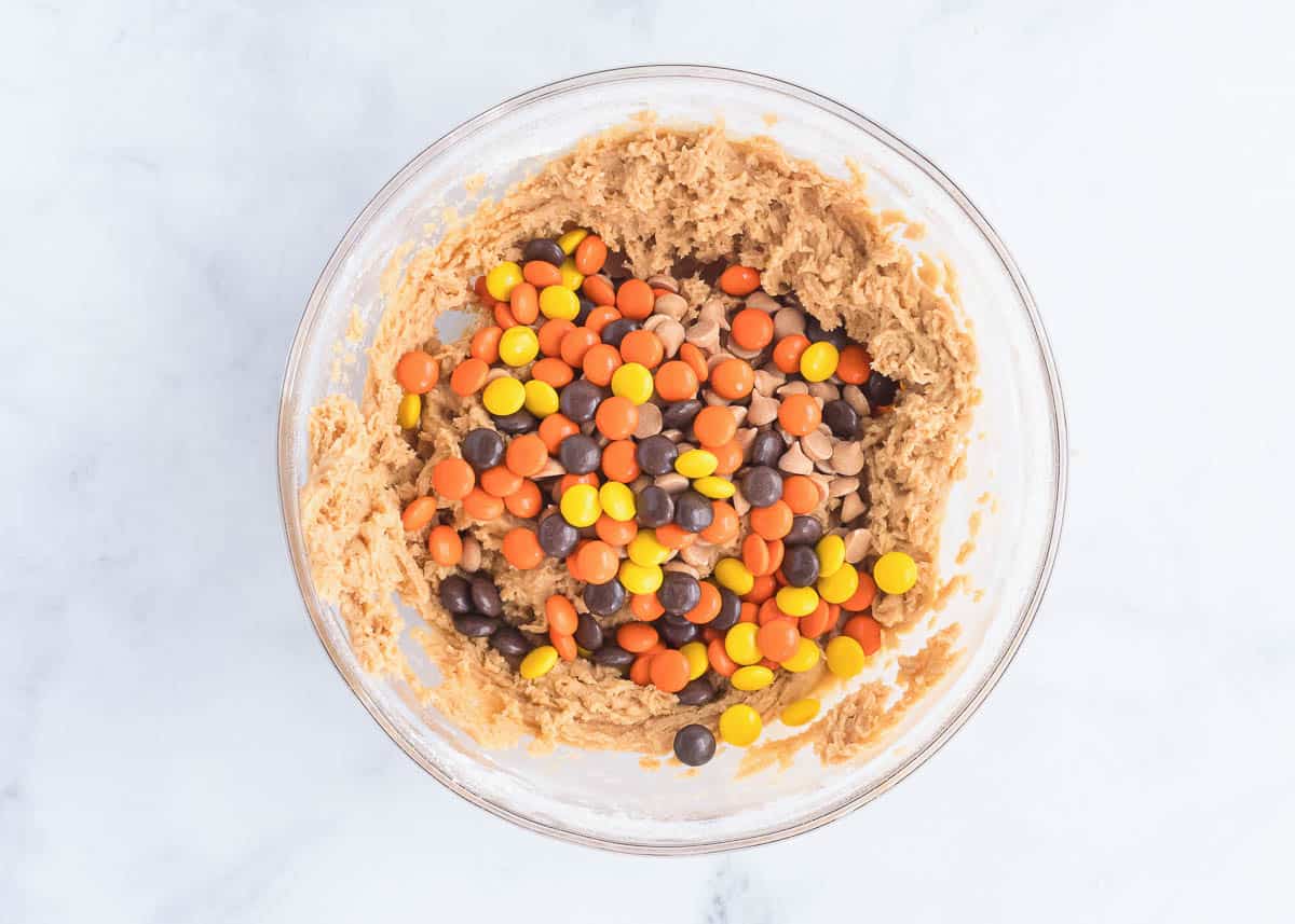 peanut butter dough and reeses in bowl