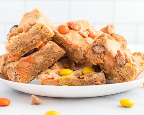 stacked peanut butter blondies on plate
