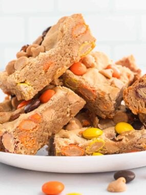 stacked peanut butter blondies on plate