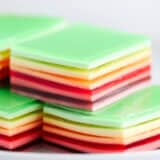 stack of rainbow jello on plate