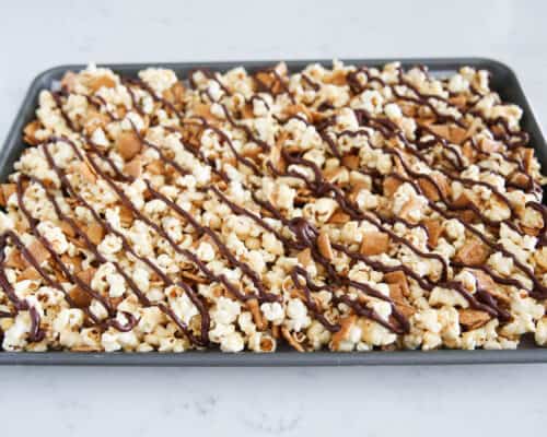 s'mores popcorn on baking sheet