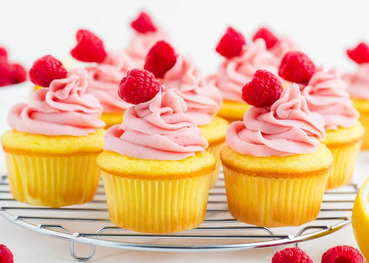 lemon raspberry cupcakes on cooling rack