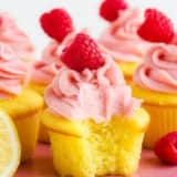 bite taken from lemon raspberry cupcake