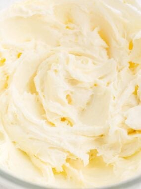 Sweet and tangy lemon cream cheese frosting in mixing bowl.
