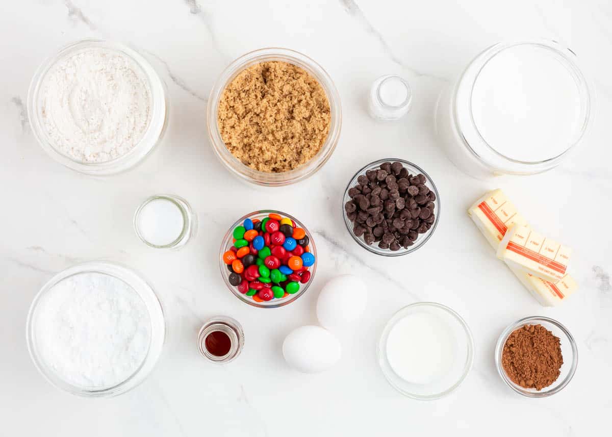 M&M cookie ingredients on marble counter top.