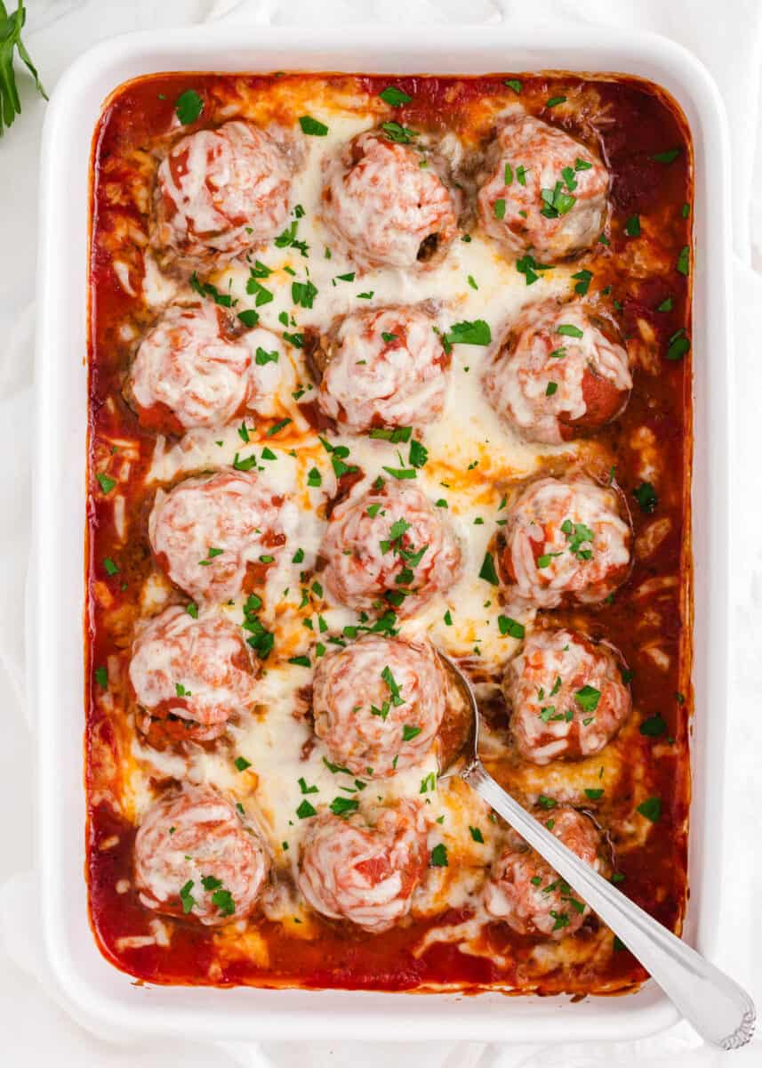 meatball casserole in white baking dish