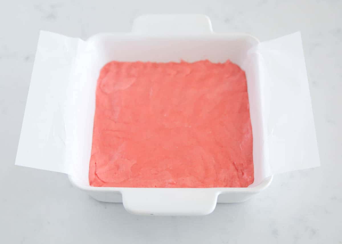 Strawberry brownie made from cake mix in baking dish.