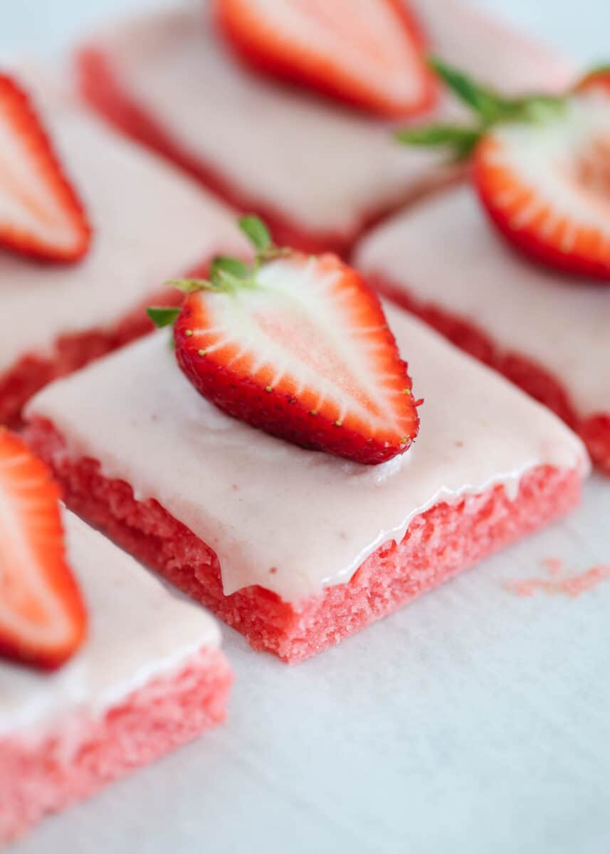 Strawberry brownie with fresh strawberry on top.