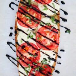 caprese bread drizzled with balsamic glaze