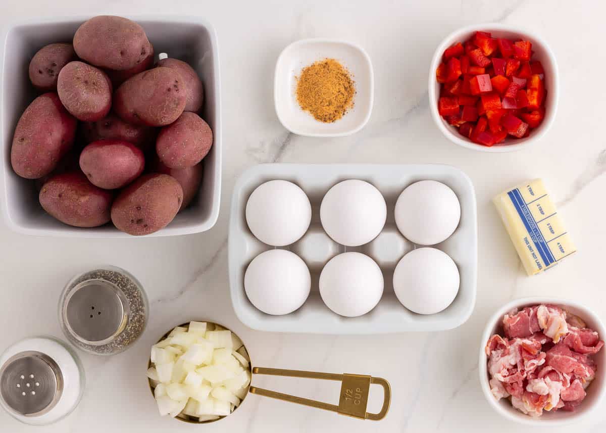 Egg skillet ingredients on counter.