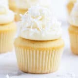 Coconut frosting frosted on a cupcake.