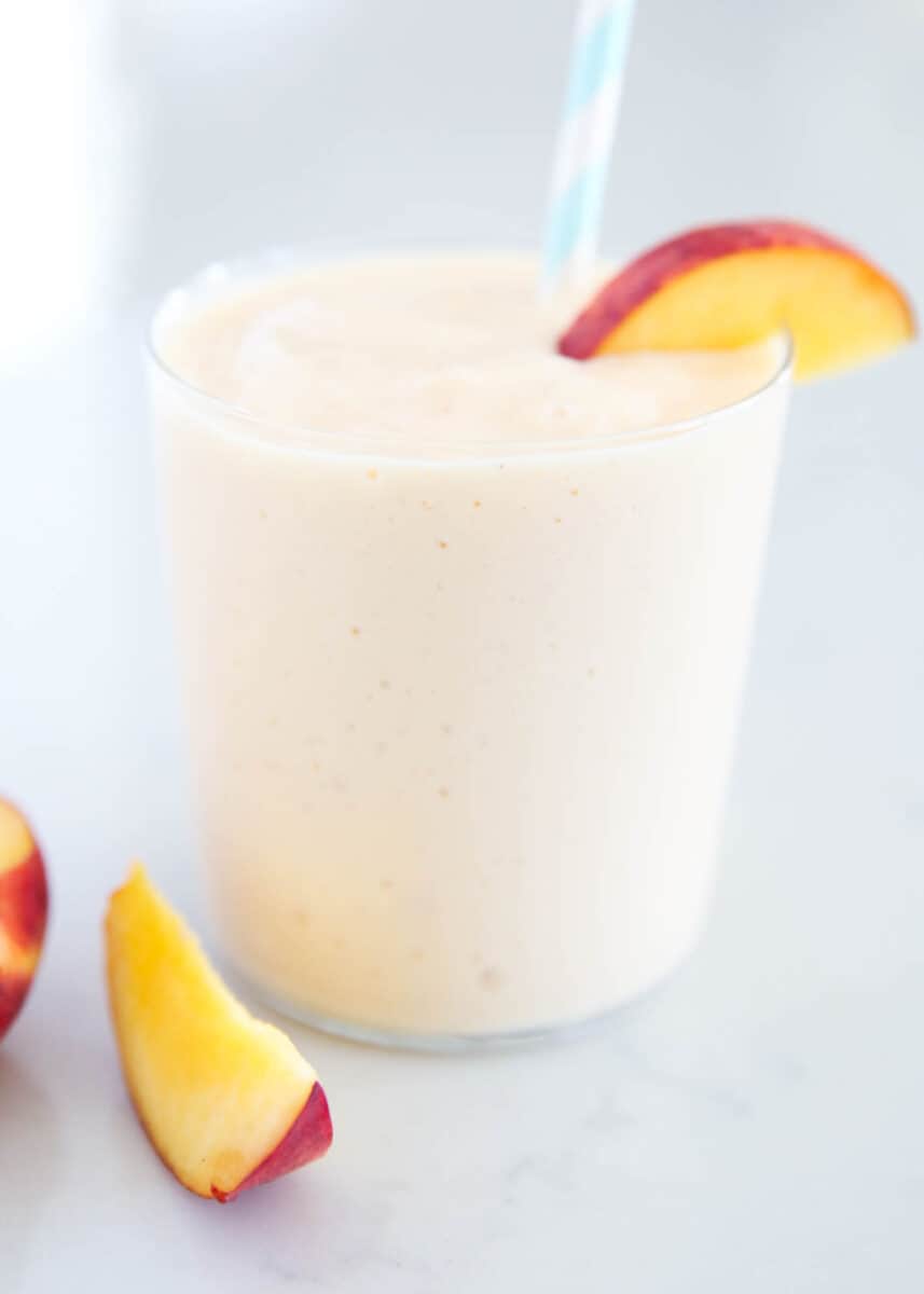 Peach smoothie on counter top.