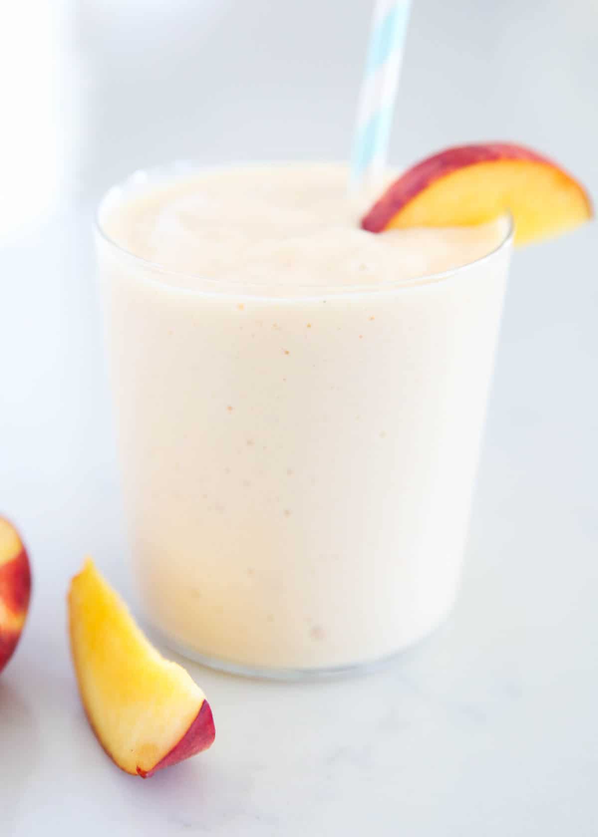 Peach smoothie on counter top.