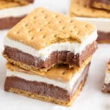 Stack of frozen s'mores on countertop.