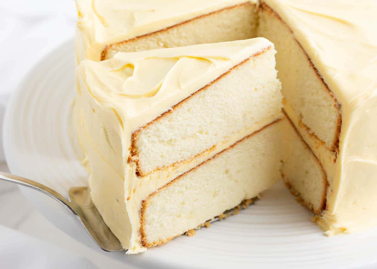 Piece of vanilla white cake on platter.