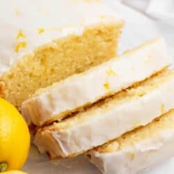 Sliced lemon loaf with lemon glaze.