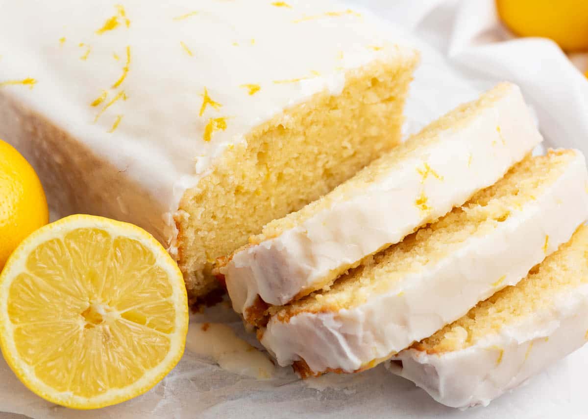 Sliced lemon loaf cake on counter.