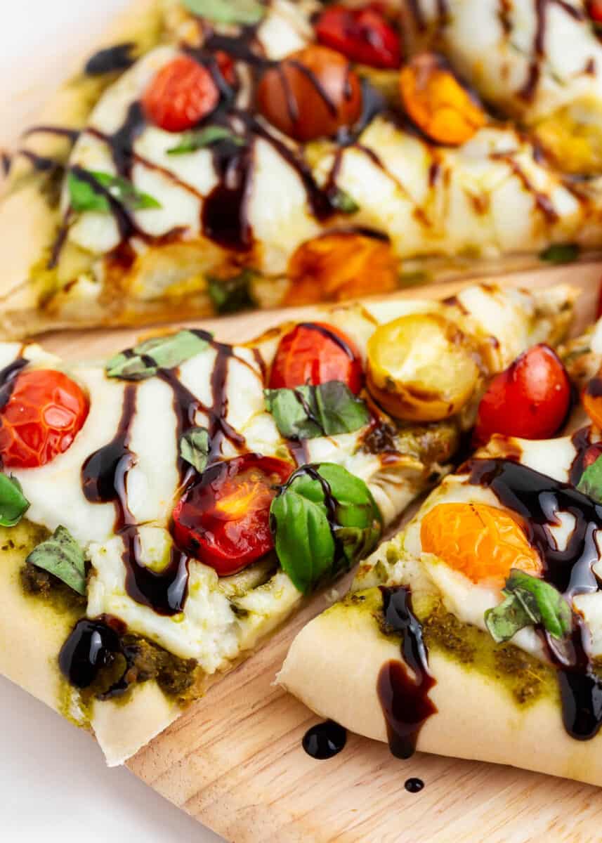 Slice of caprese pizza.