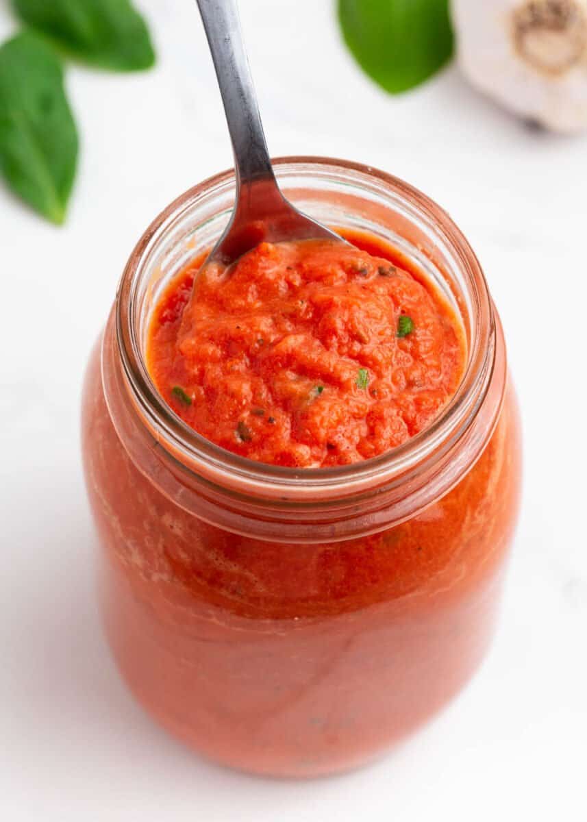 Roasted garlic tomato sauce in mason jar.