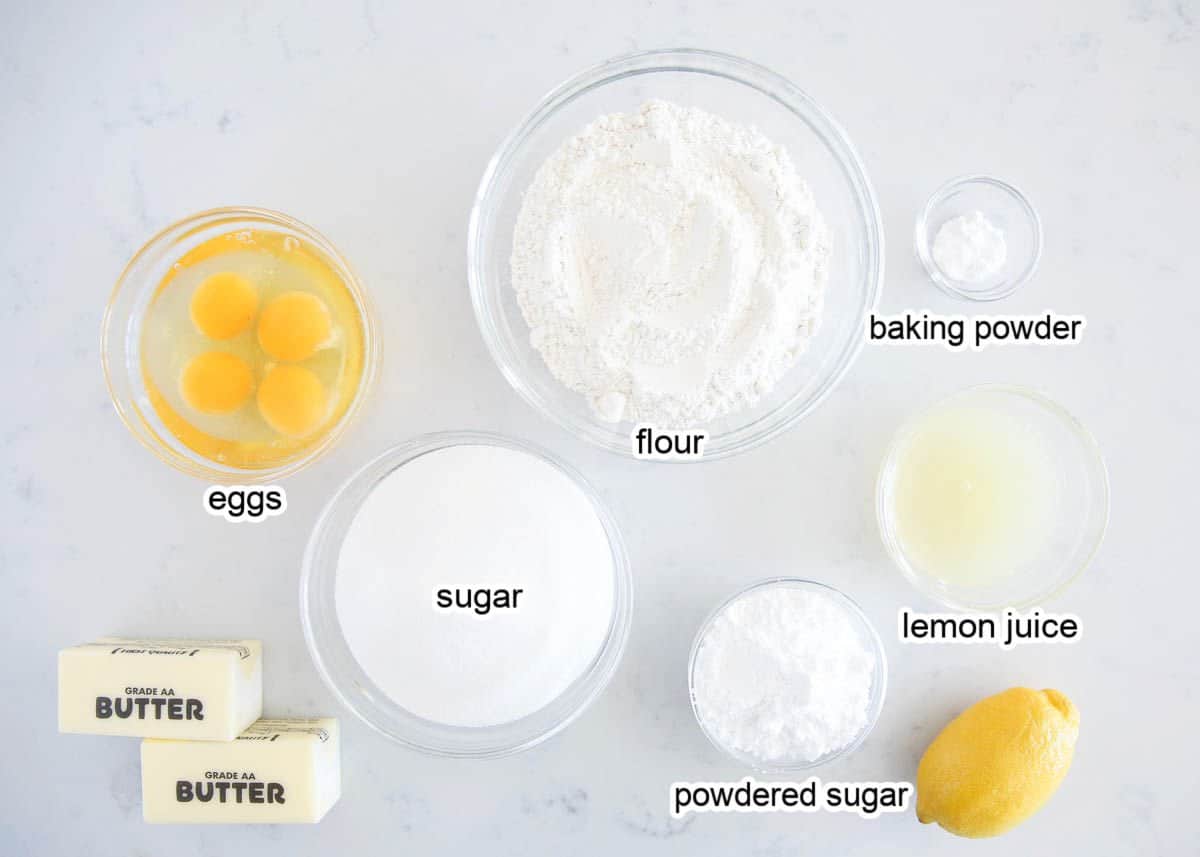 Lemon bar ingredients on marble countertop.