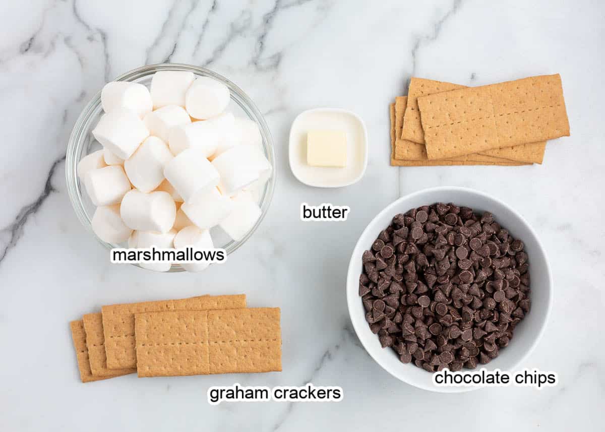 S'mores dip ingredients on marble countertop.