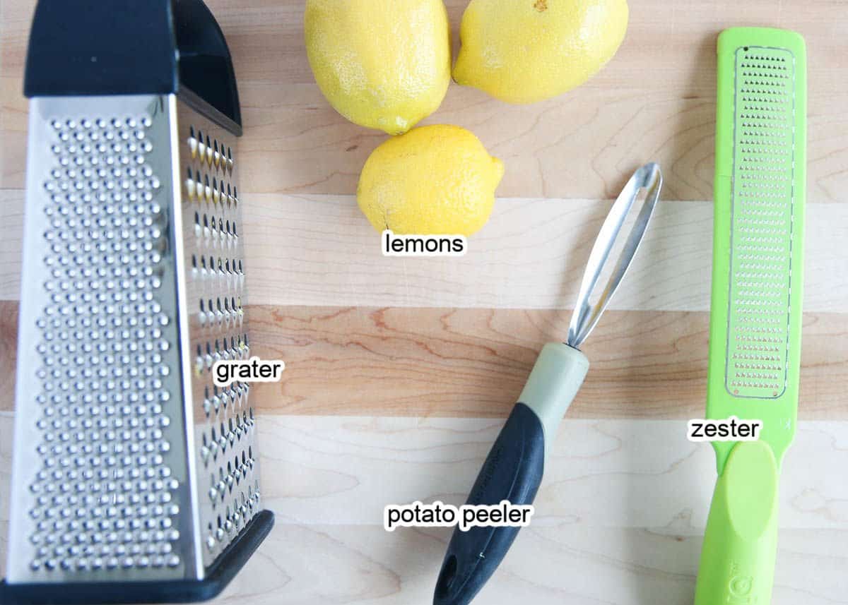 Lemon zest tools on cutting board.