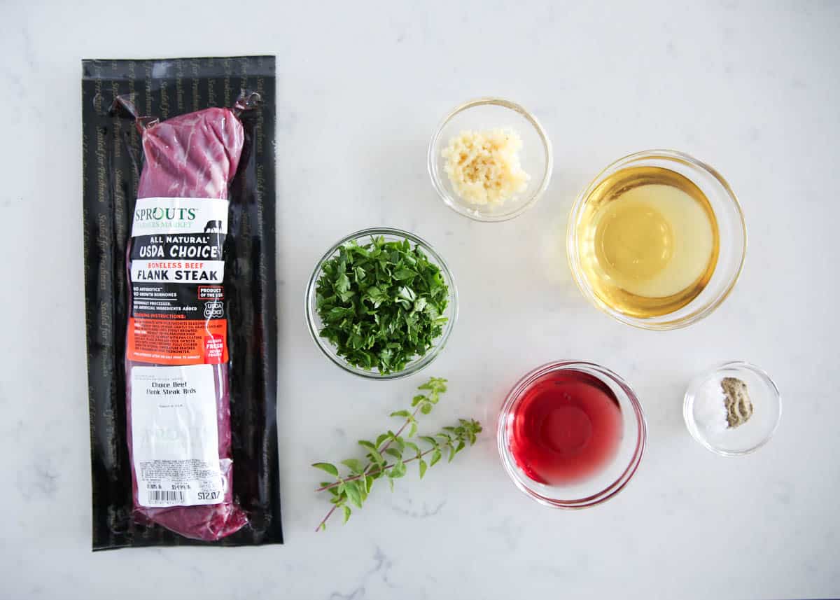 Chimichurri steak ingredients on counter. 