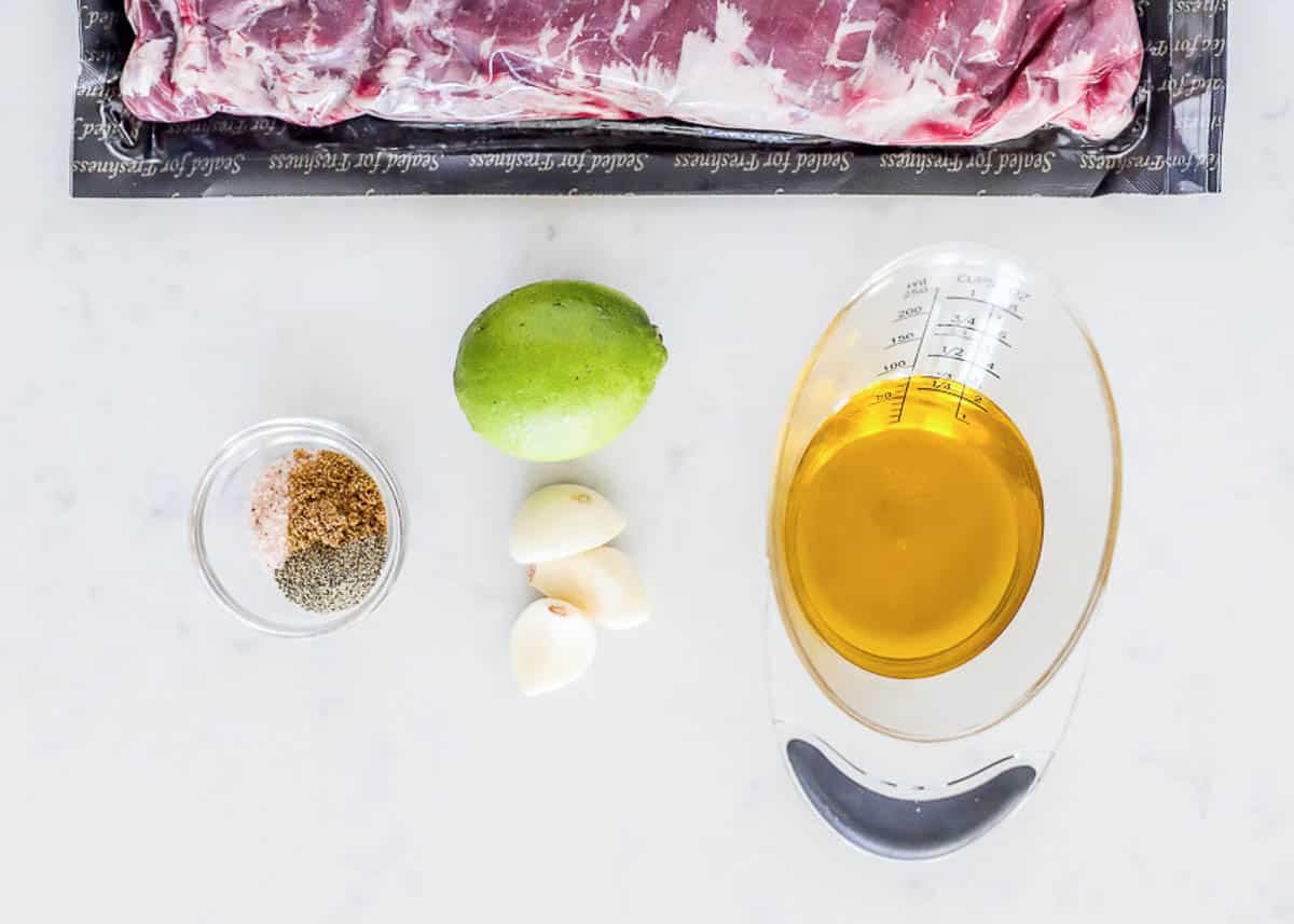 Flank steak marinade ingredients on counter.