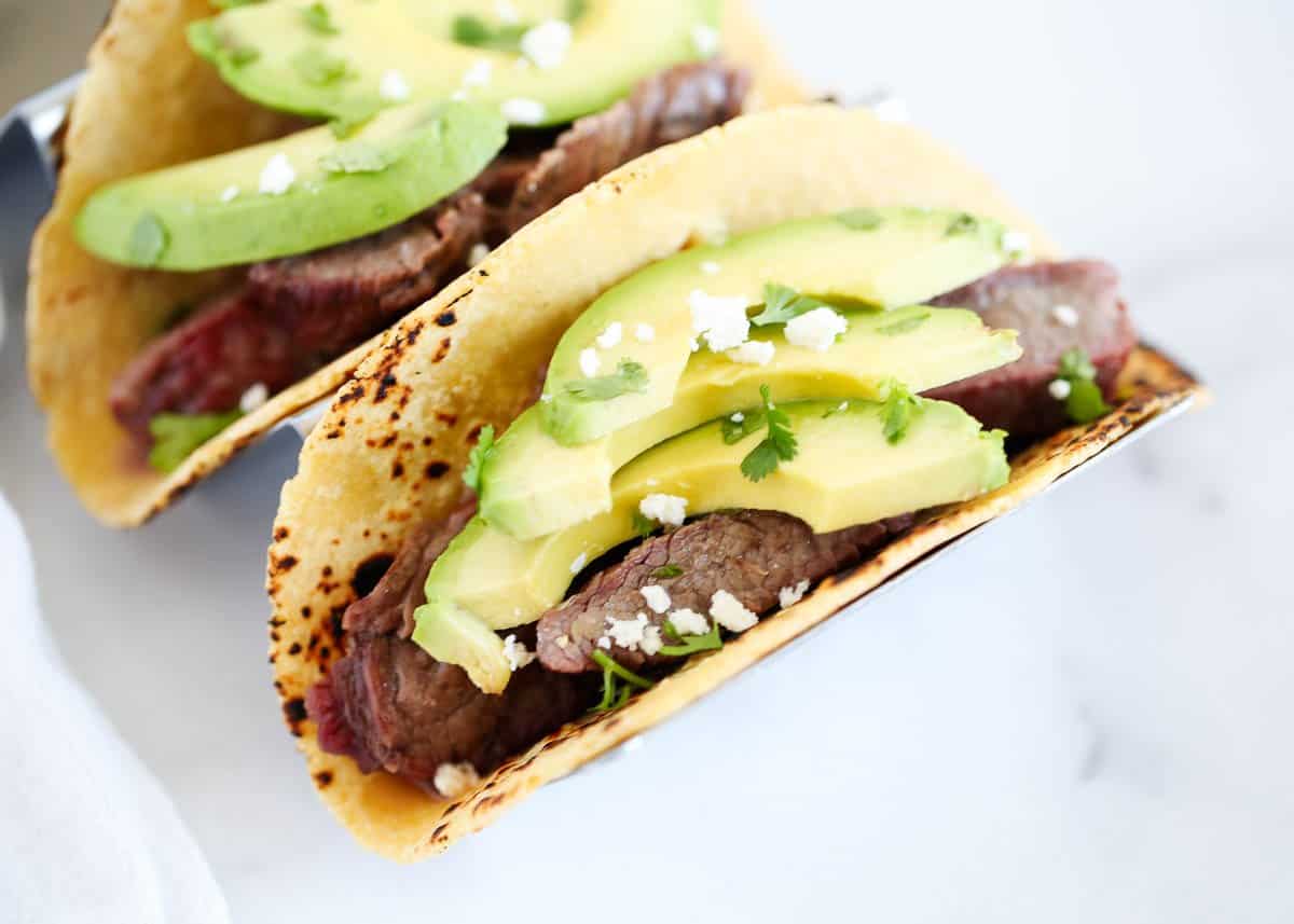 Flank steak taco with avocados.