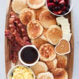 Pancake charcuterie board on marble counter.