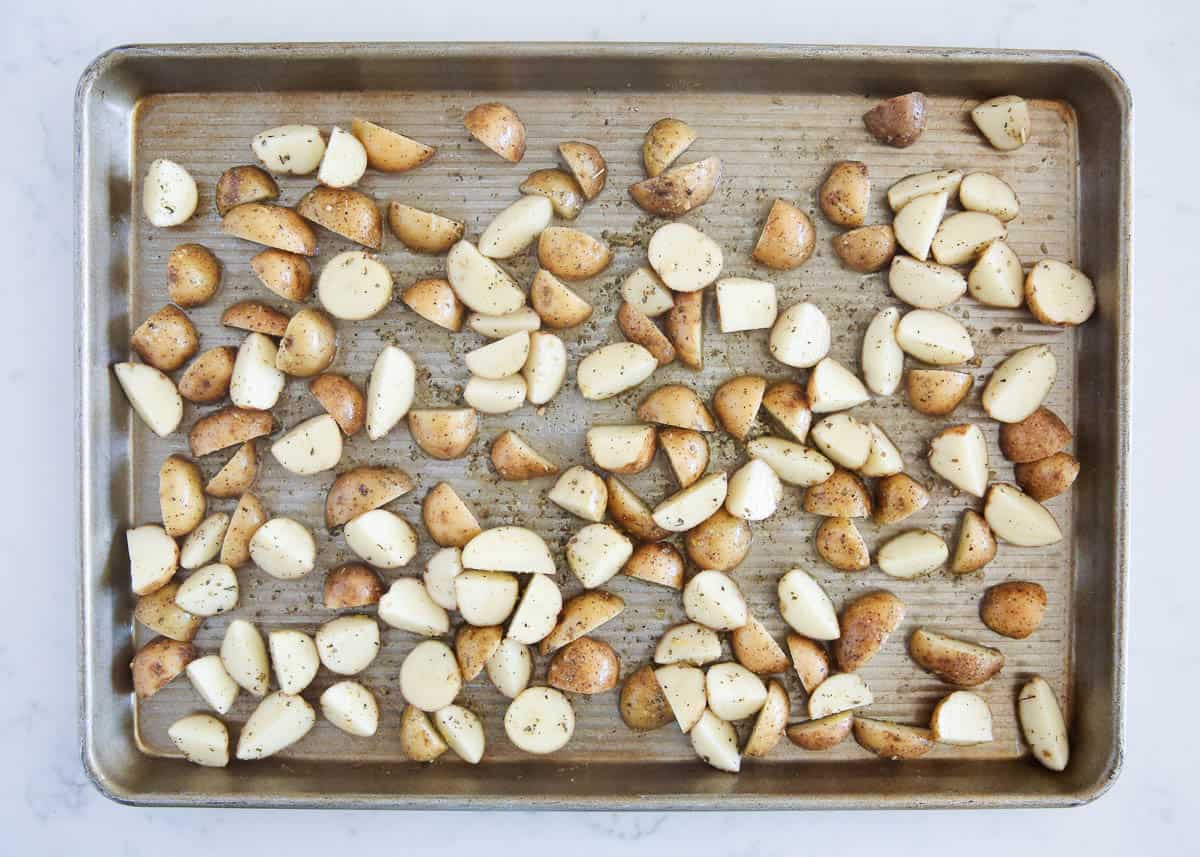 Potatoes on a baking sheet.