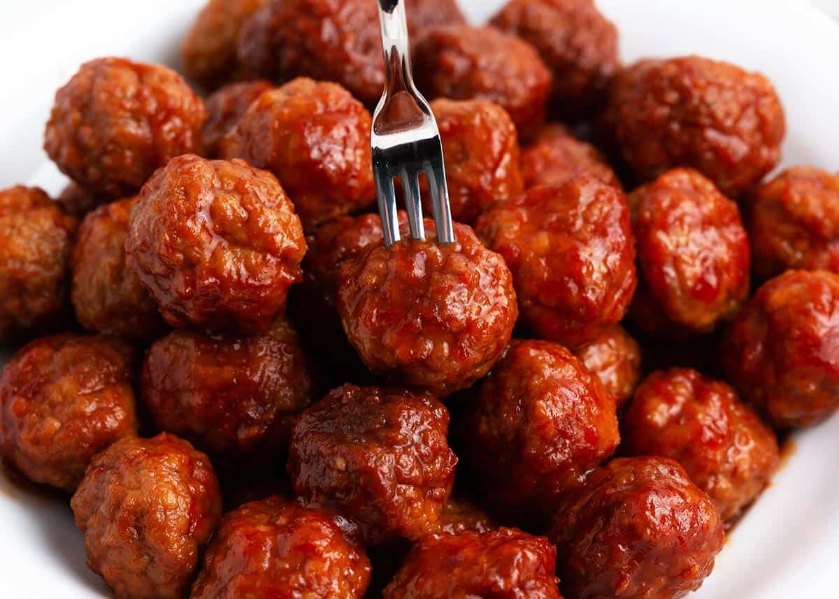 Chili sauce meatballs with a mini fork.