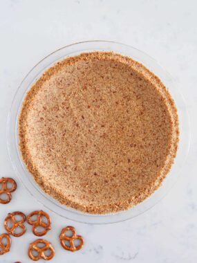 Baked pretzel crust on counter.