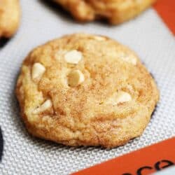 Pumpkin snickerdoodle cookie on baking sheet.