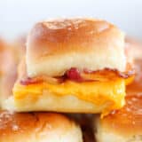 Breakfast slider with cheese and bacon.