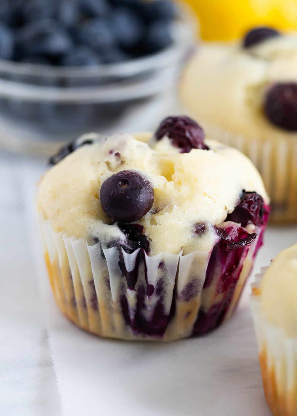 Lemon blueberry muffin on counter.