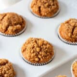 Pumpkin muffins made with a cake mix in muffin pan.