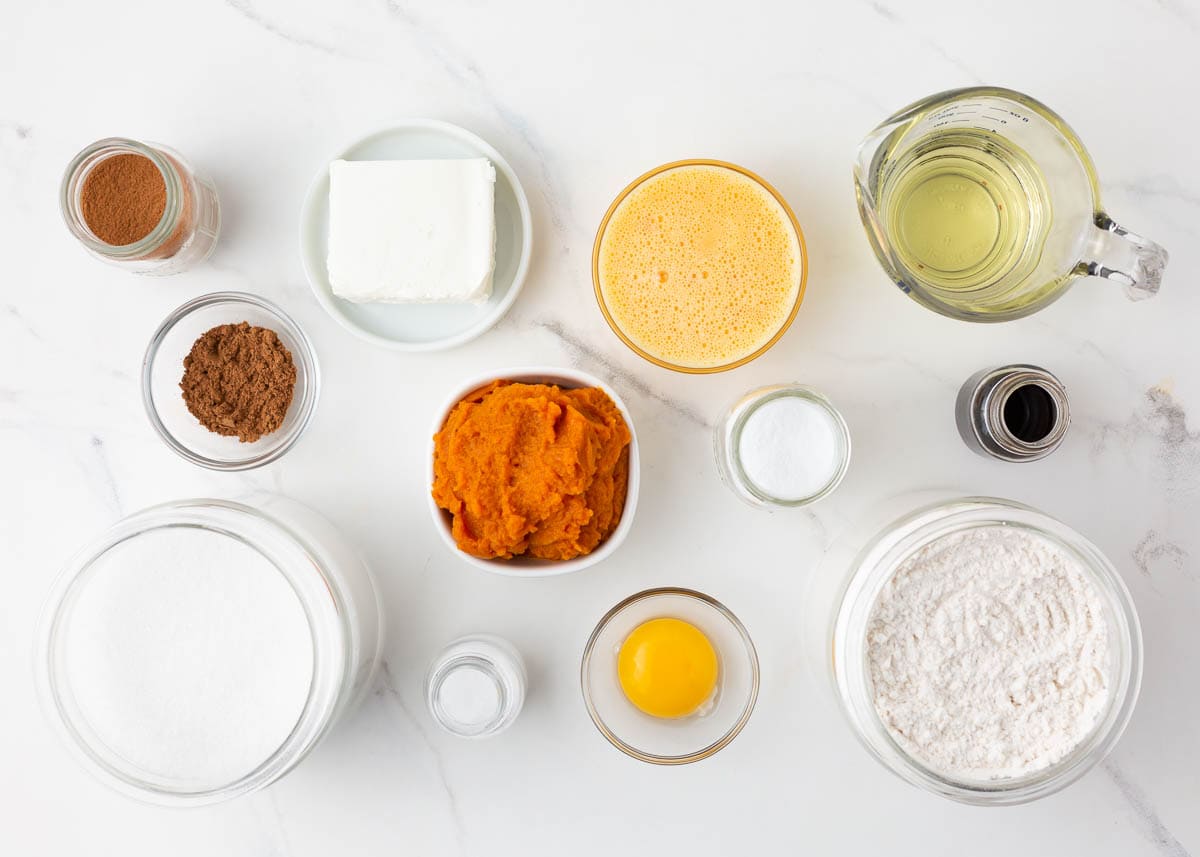 Pumpkin cream cheese bread ingredients on counter.